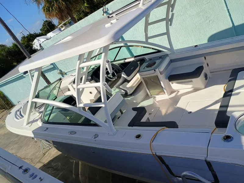 Slide: The Image of 2024 Robalo R317 Dual Console boat with spacious seating and modern design. - 15