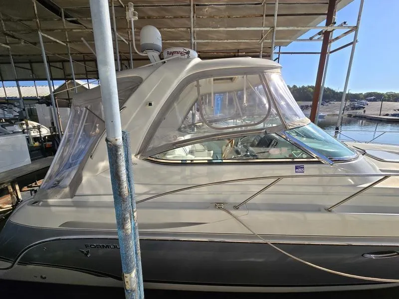 Slide: The Image of 2008 Formula 37 PC yacht docked under shelter with clear canopy and radar equipment. - 15