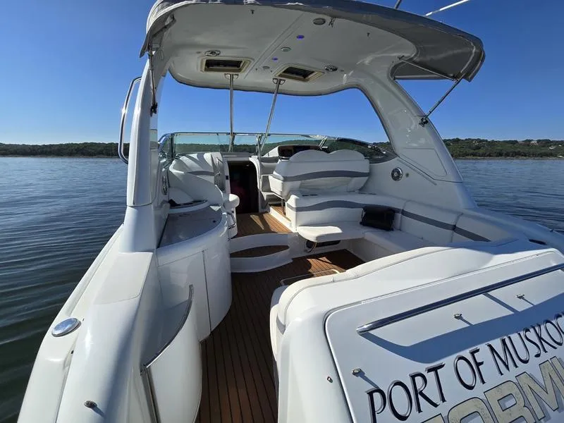 Slide: The Image of 2008 Formula 37 PC yacht with spacious deck and seating, on calm water. - 19