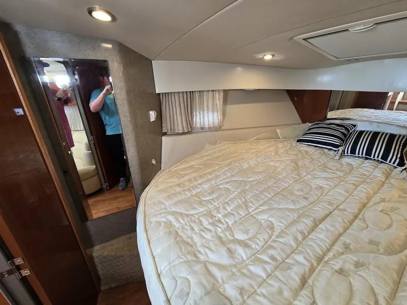 Slide: The Image of Interior of 2008 Formula 37 PC yacht with cozy bed and striped pillows. - 35
