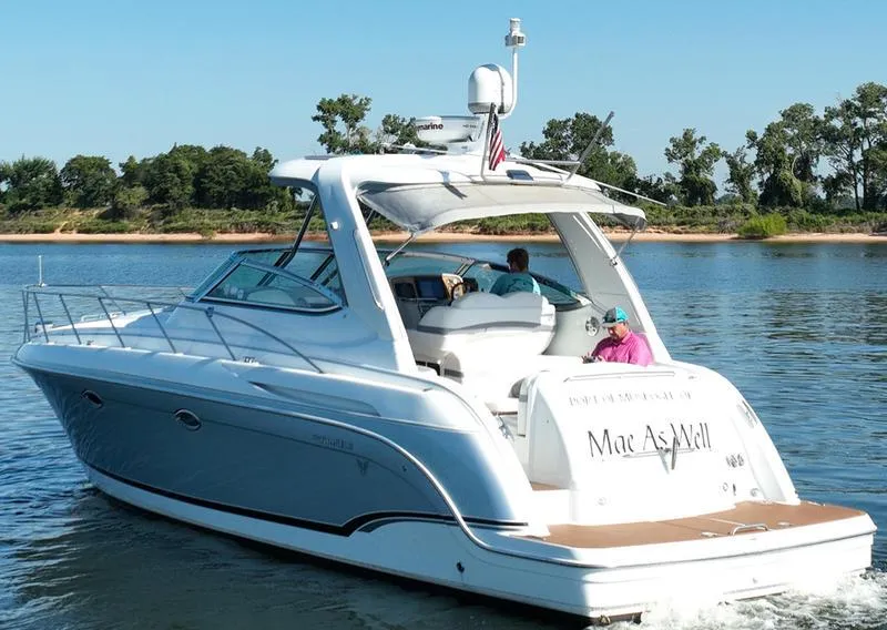 Slide: The Image of 2008 Formula 37 PC yacht cruising on a lake with passengers onboard. - 4