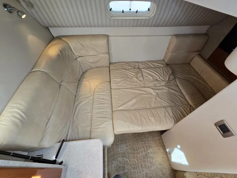 Slide: The Image of 2008 Formula 37 PC interior with beige leather seating and compact window. - 41