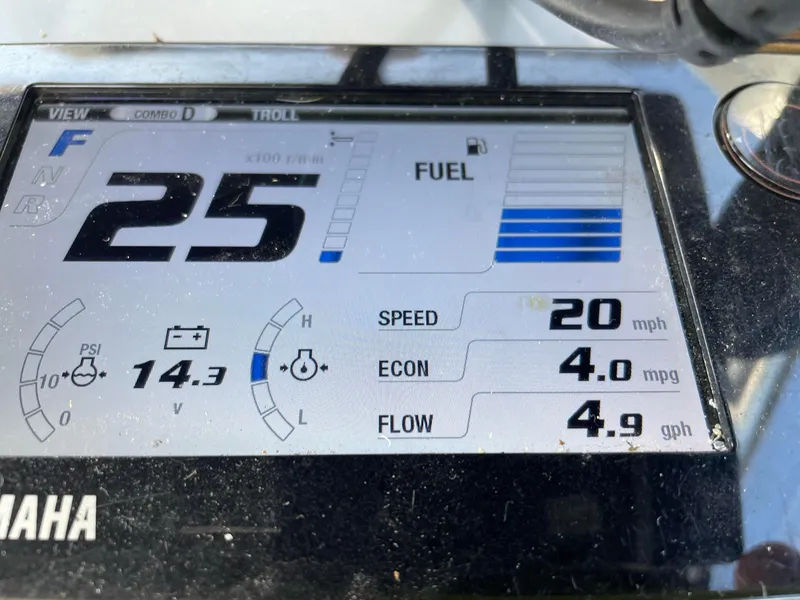 Slide: The Image of Yamaha boat display showing speed, fuel, and engine metrics on a Custom Carolina Express 2011. - 11