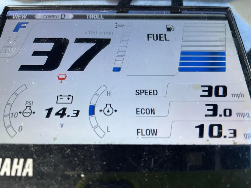 Slide: The Image of Yamaha boat display showing speed, fuel, and engine metrics for 2011 Custom Carolina Express. - 12