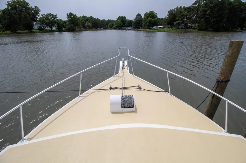 Slide: The Image of Bow view of 2008 Chesapeake 48 Deadrise boat on calm river. - 30