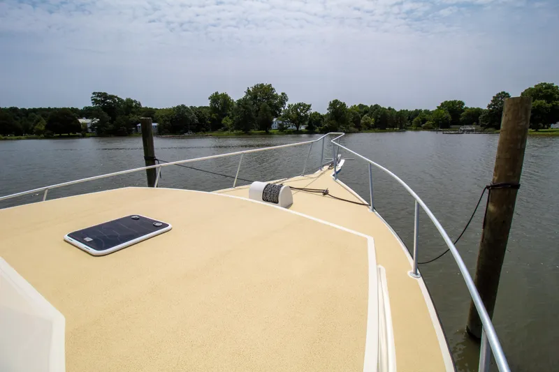 Slide: The Image of Chesapeake 48 Deadrise boat docked on a calm river, 2008 model. - 31