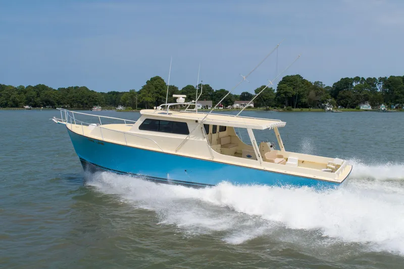 Slide: The Image of 2008 Chesapeake 48 Deadrise boat cruising on a calm lake. - 34