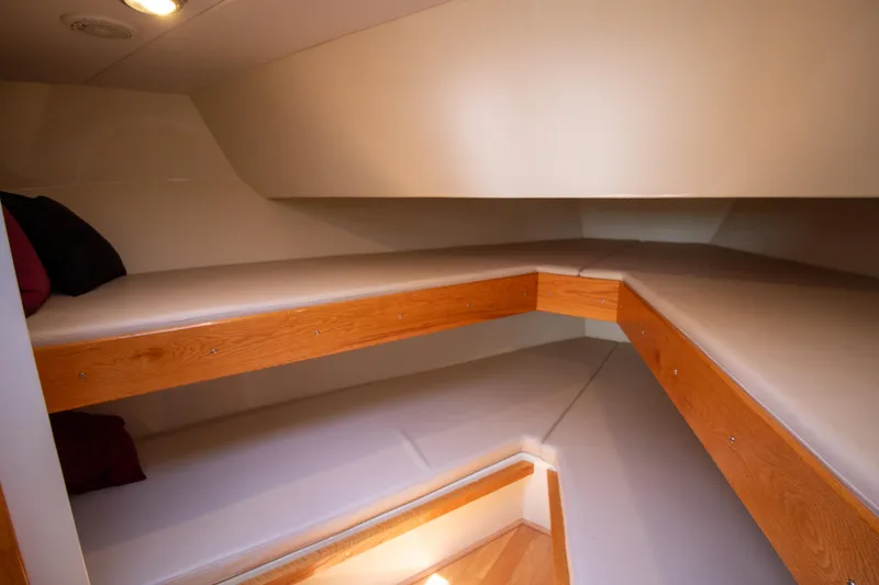 Slide: The Image of Interior cabin of 2008 Chesapeake 48 Deadrise boat with wooden bunk beds. - 5