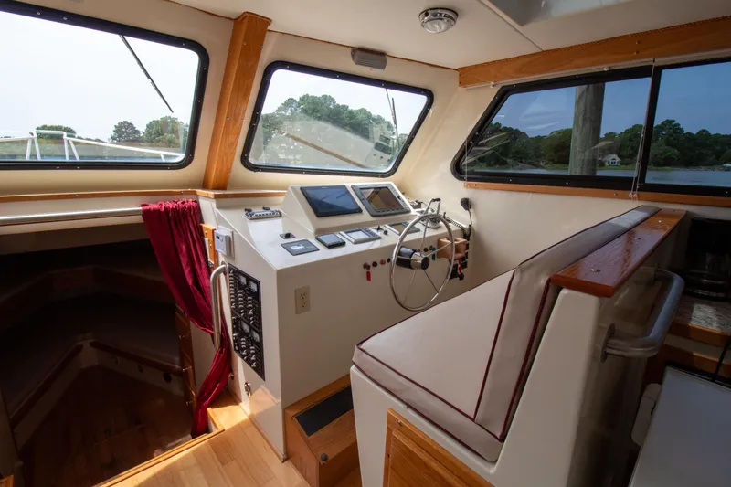 Slide: The Image of Interior of 2008 Chesapeake 48 Deadrise boat with helm and navigation equipment. - 8