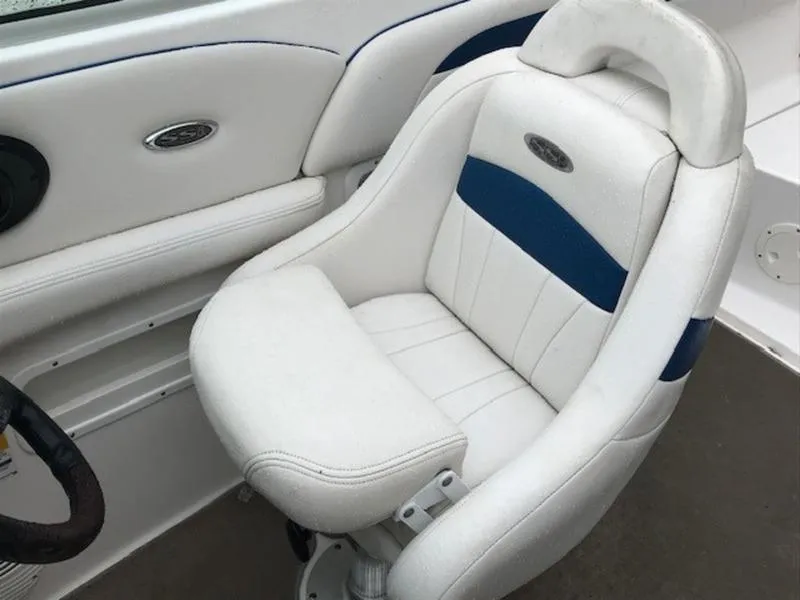 Slide: The Image of 2001 Chaparral 235 SSi boat seat, white with blue accents, luxurious and comfortable design. - 9
