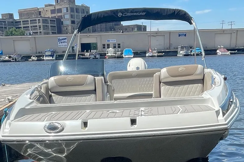 Slide: The Image of 2020 Crownline E 205 XS boat docked at marina, sunny day. - 20