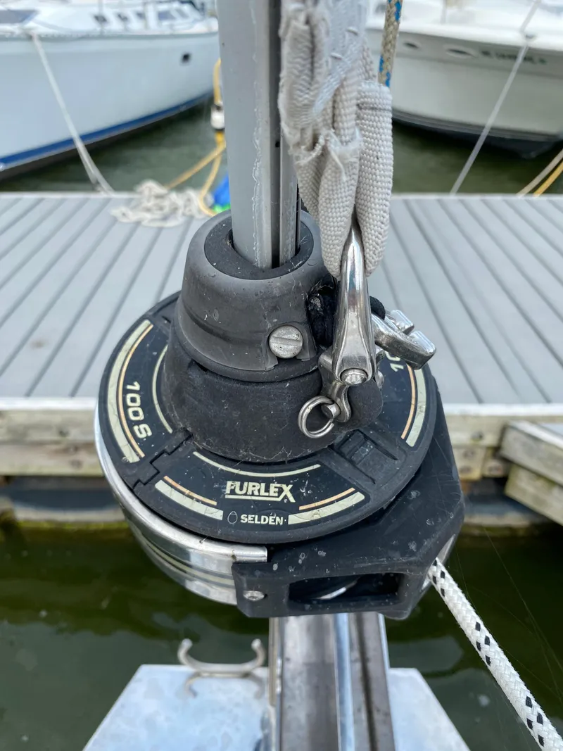 Slide: The Image of Furlex 100S furling system on a 2008 Hunter 33 sailboat at dock. - 17