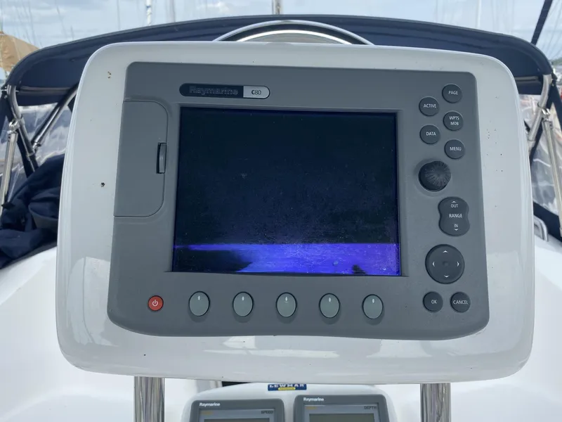 Slide: The Image of Raymarine C80 navigation display on a 2008 Hunter 33 sailboat cockpit. - 42