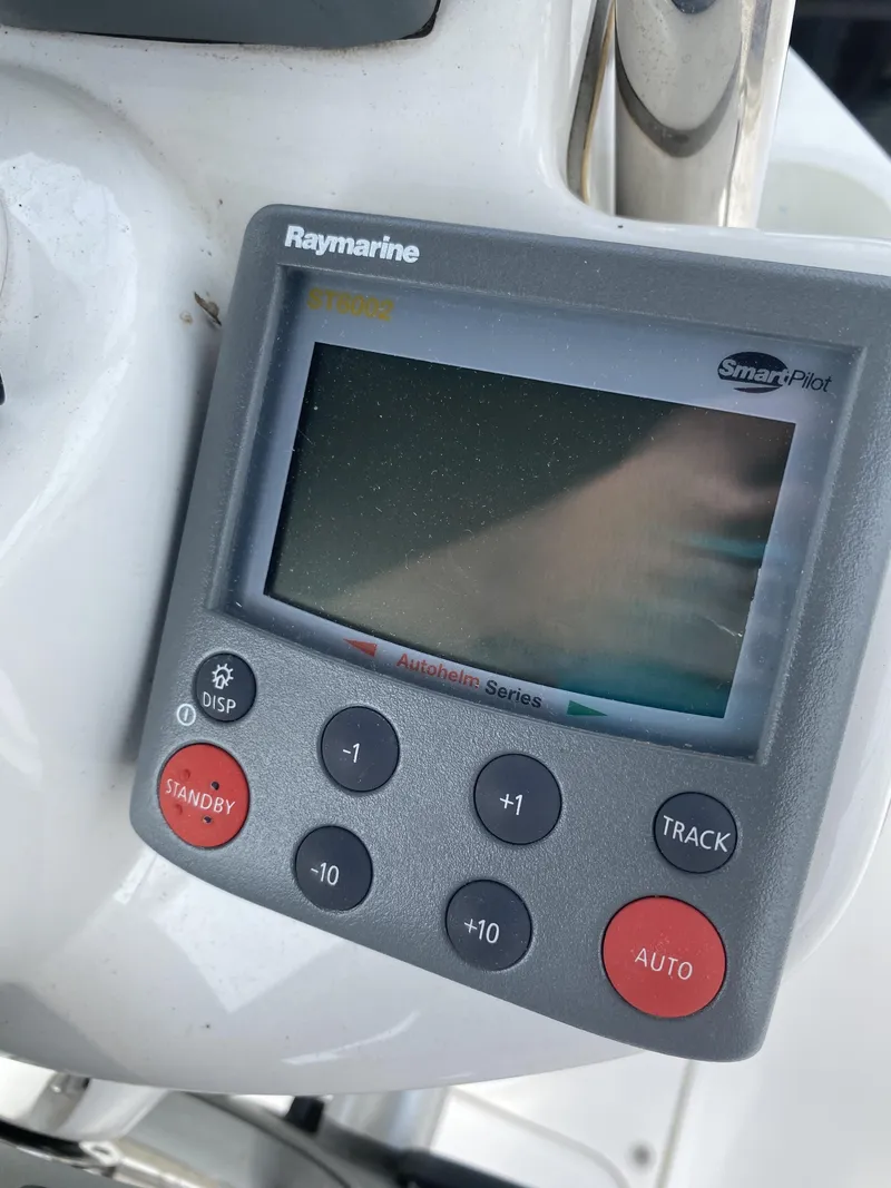 Slide: The Image of Raymarine autopilot control panel on a 2008 Hunter 33 sailboat. - 45