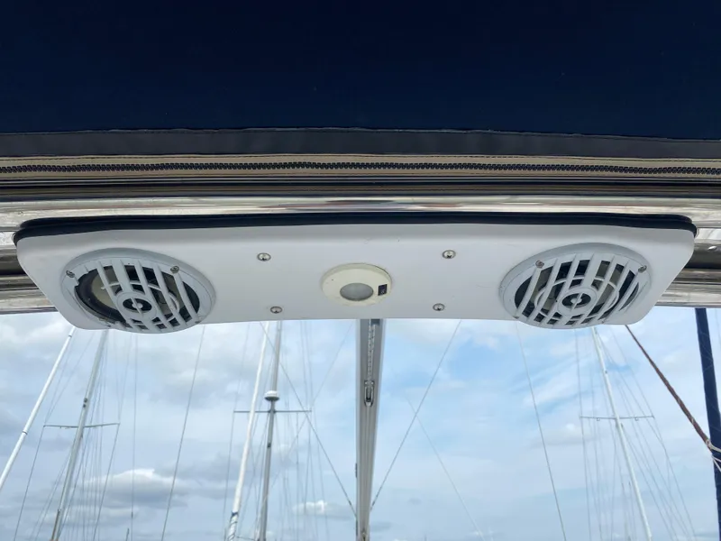 Slide: The Image of Ceiling speakers on a 2008 Hunter 33 sailboat, with a clear sky background. - 47