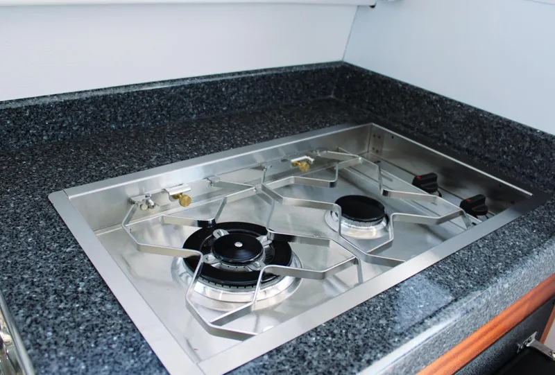 Slide: The Image of Stainless steel stove on Ocean Sport 30 Roamer 2022 boat. - 7