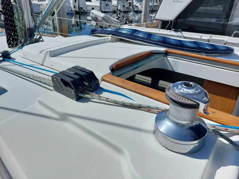 Slide: The Image of Deck of 2002 Beneteau Oceanis 42CC sailboat with winch and ropes. - 19