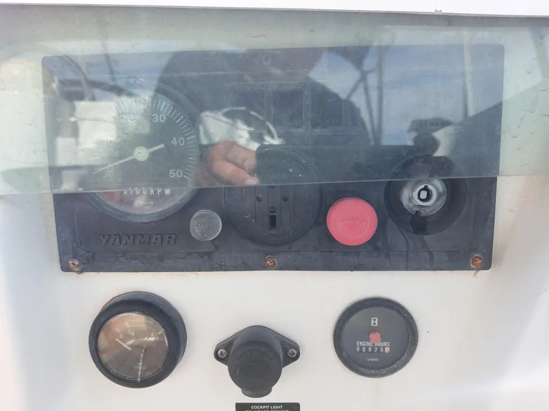 Slide: The Image of Control panel of 2002 Beneteau Oceanis 42CC sailboat with Yanmar engine gauges. - 27