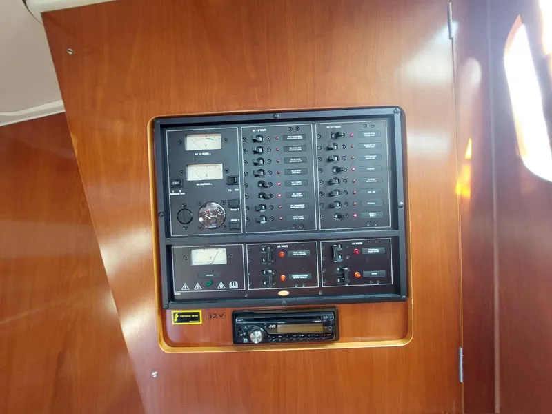 Slide: The Image of Electrical control panel on 2002 Beneteau Oceanis 42CC sailboat. - 36