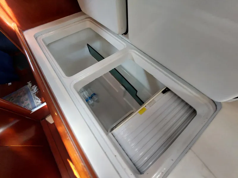 Slide: The Image of Beneteau Oceanis 42CC 2002 yacht interior storage compartments. - 47