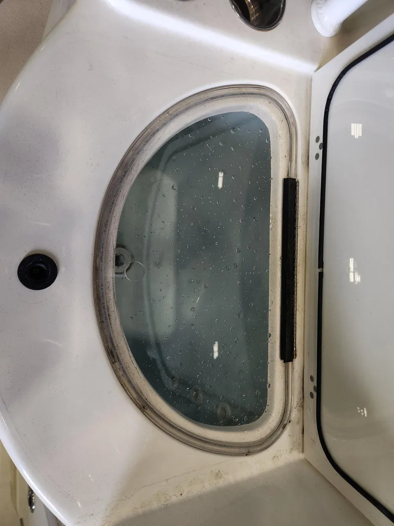 Slide: The Image of Livewell on a 2016 Key West 281 Billistic boat, filled with water. - 24