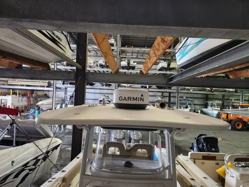 Slide: The Image of 2016 Key West 281 Billistic boat with Garmin equipment in a storage facility. - 25