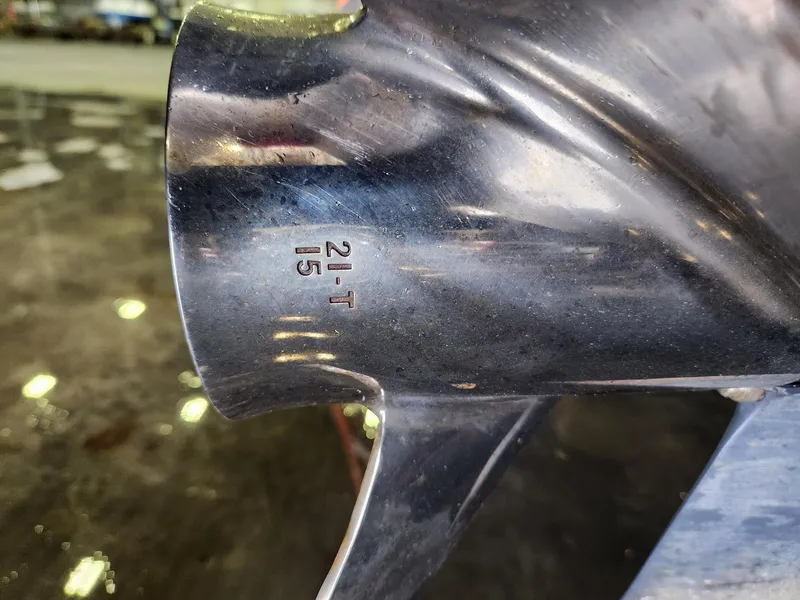 Slide: The Image of Close-up of a 2016 Key West 281 Billistic boat propeller with engraved markings. - 32