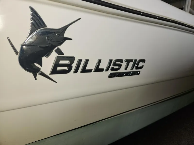 Slide: The Image of 2016 Key West 281 Billistic boat logo with marlin design on white hull. - 5