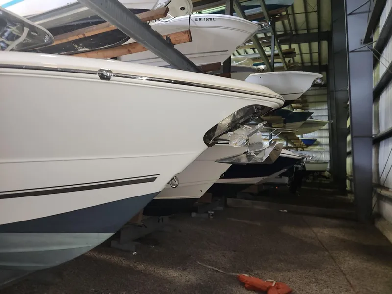 Slide: The Image of 2016 Key West 281 Billistic boats in indoor storage facility. - 7