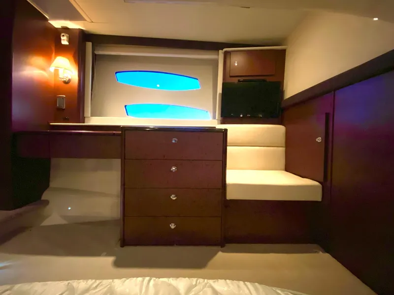 Slide: The Image of Luxurious interior of 2014 Meridian 441 Sedan yacht with elegant wood finish. - 14