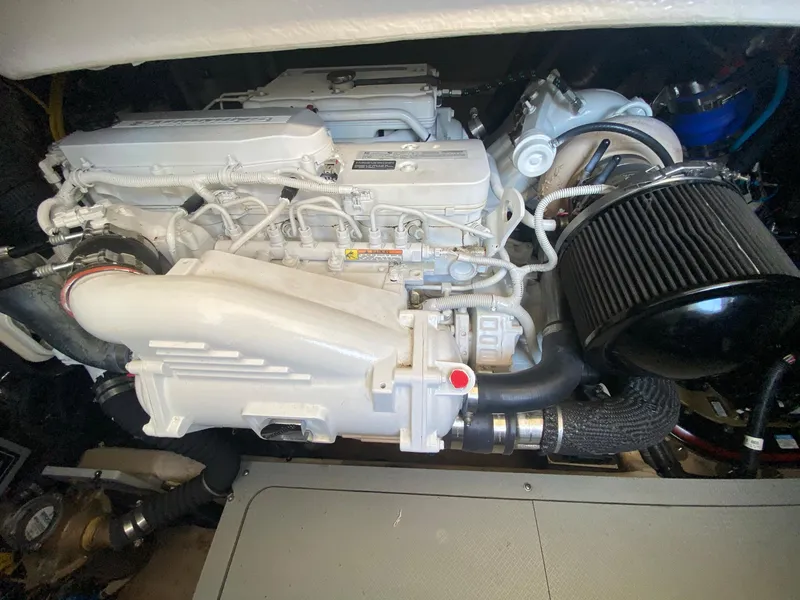 Slide: The Image of Engine of 2014 Meridian 441 Sedan yacht, showcasing intricate mechanical components. - 24