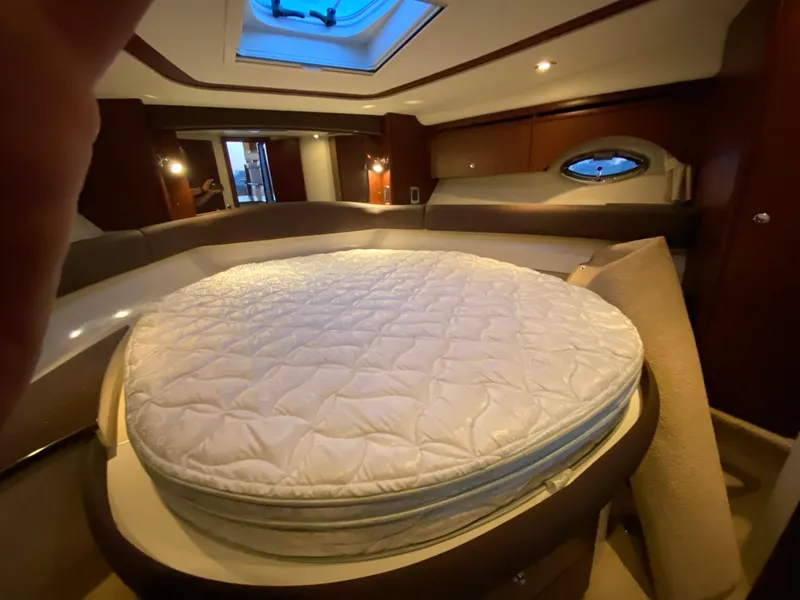 Slide: The Image of Luxurious 2014 Meridian 441 Sedan yacht interior with round bed and skylight. - 16