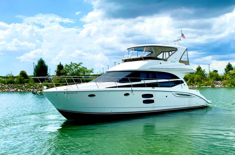 Slide: The Image of 2014 Meridian 441 Sedan yacht cruising on a sunny day. - 1