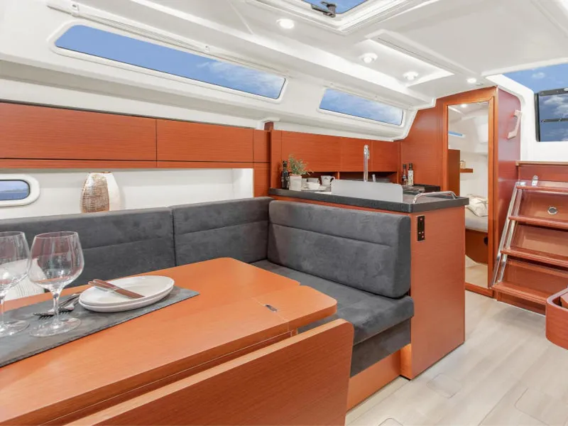 Slide: The Image of Interior of 2025 Hanse 348 yacht with modern dining area and sleek design. - 7