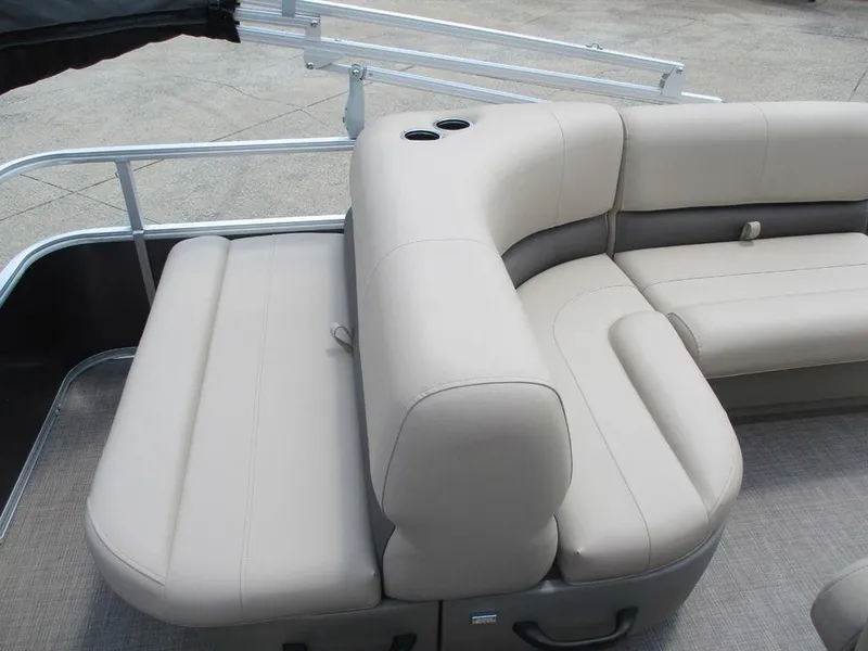Slide: The Image of 2024 Sun Tracker PARTY BARGE® 18 DLX, beige seating, cup holders, spacious layout. - 11