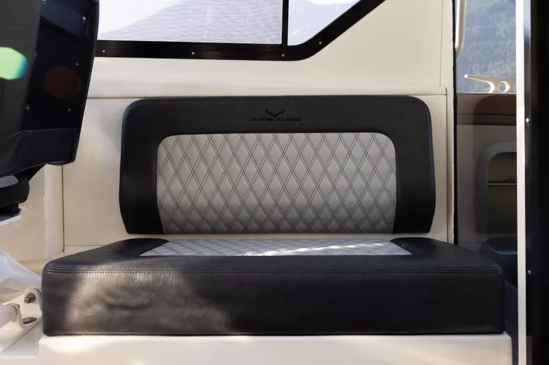 Slide: The Image of Interior seating of 2026 Jasper Marine Defender 22 with diamond-pattern upholstery. - 26