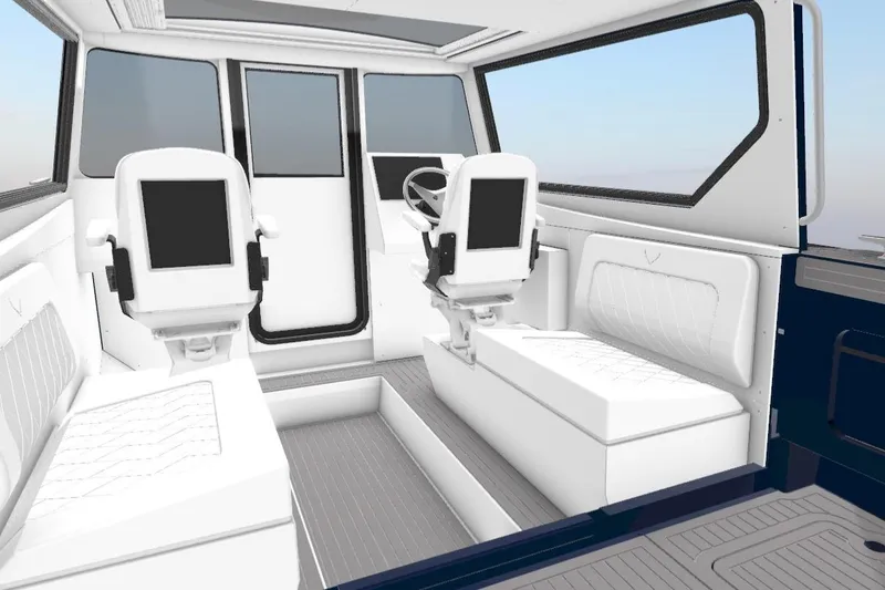 Slide: The Image of Interior of 2026 Jasper Marine Defender 22 boat, featuring modern seating and controls. - 3