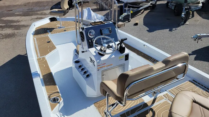 Slide: The Image of 2025 Xpress H22 Bay boat with Yamaha Vmax 175 SHO, featuring modern interior and controls. - 11