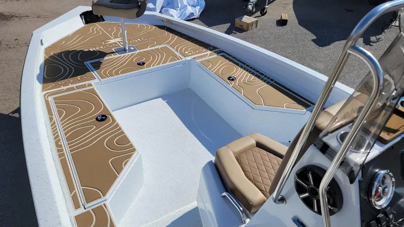 Slide: The Image of 2025 Xpress H22 Bay boat interior with Yamaha Vmax 175 SHO, featuring stylish seating and deck design. - 12
