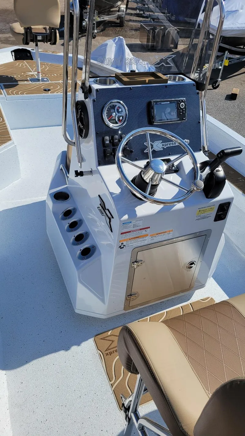 Slide: The Image of 2025 Xpress H22 Bay boat console with Yamaha Vmax 175 SHO engine. - 7