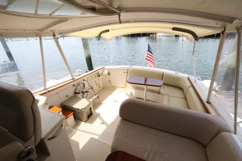 Slide: The Image of Interior of a 2002 Island Packet 360 yacht with seating area. - 10