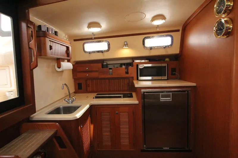 Slide: The Image of Interior of Island Packet 360 yacht kitchen, year 2002. - 19