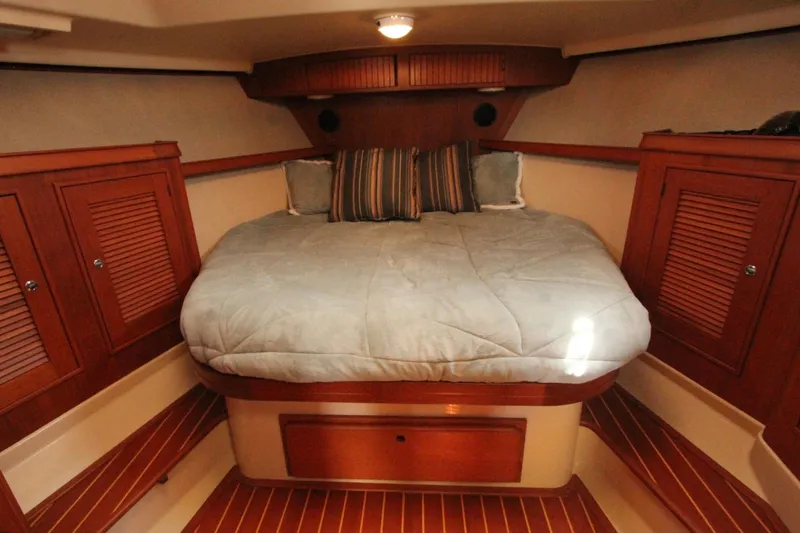Slide: The Image of Interior of a 2002 Island Packet 360 yacht with cozy bed. - 20