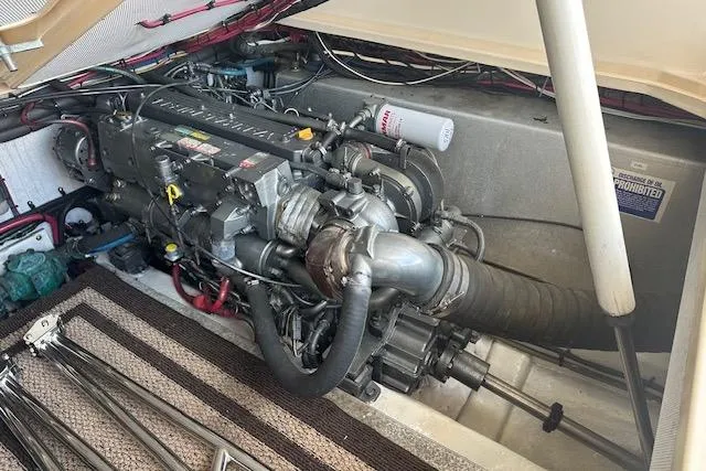 Slide: The Image of Engine compartment of a 2002 Island Packet Packet Craft 36 boat, showcasing detailed machinery. - 32