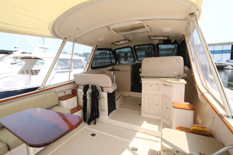 Slide: The Image of Interior of a 2002 Island Packet 360 yacht with seating area and table. - 6