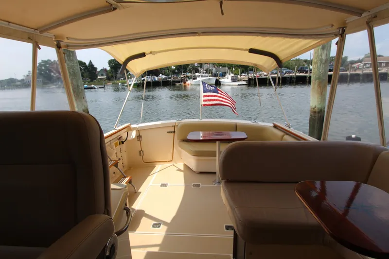 Slide: The Image of Interior view of a 2002 Island Packet 360 yacht overlooking the water. - 9