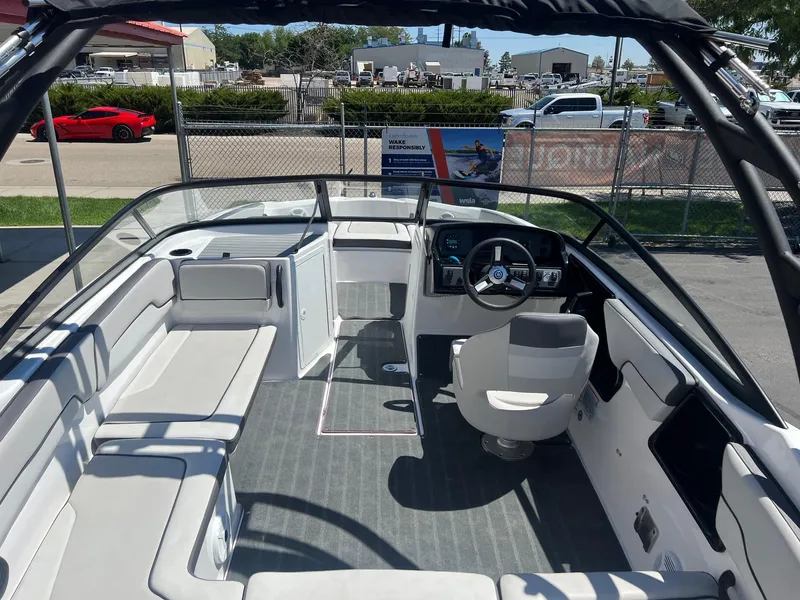 Slide: The Image of 2023 Yamaha AR 190 jet boat interior with seating and steering wheel. - 11