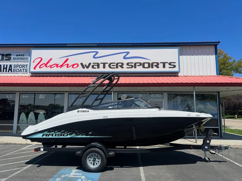 Slide: The Image of 2023 Yamaha AR 190 jet boat displayed at Idaho Water Sports dealership. - 3