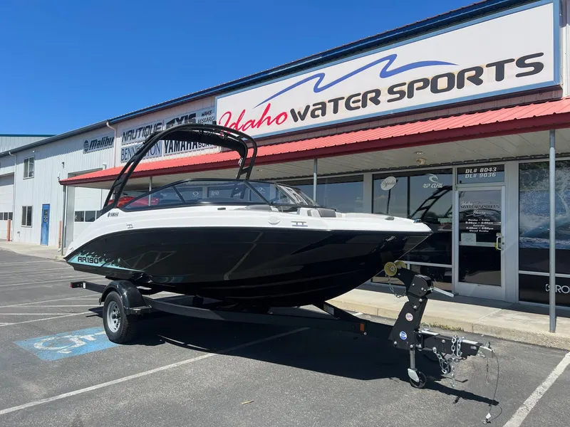 Slide: The Image of 2023 Yamaha AR 190 jet boat displayed at Idaho Water Sports dealership. - 4