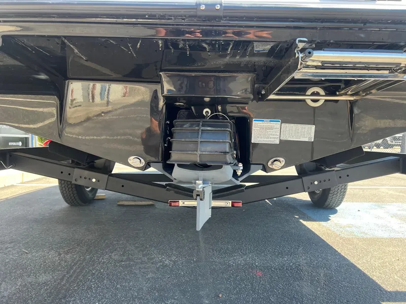 Slide: The Image of 2023 Yamaha AR 190 jet boat underside view, showcasing the propulsion system and trailer. - 9